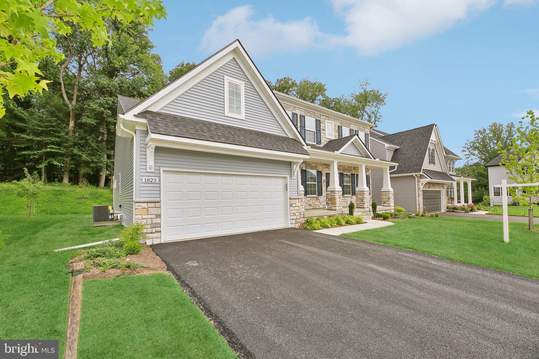 1823 Colt Lane Frederick, MD 21702 - Photo 6 of 66 front view of a house with a yard