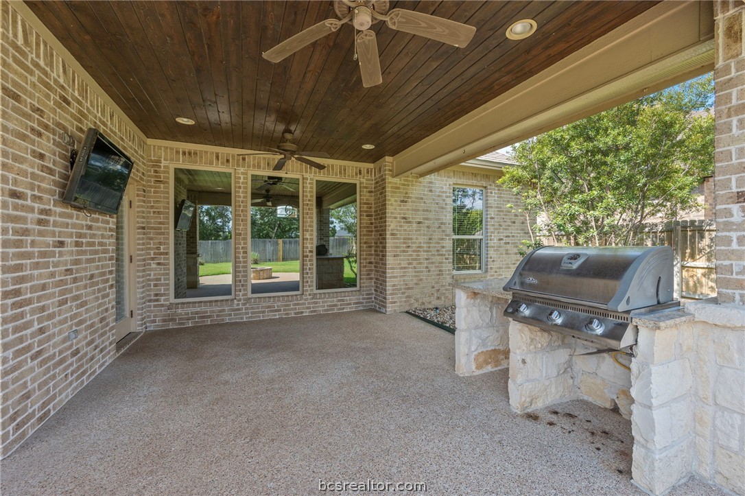 3028 Embers Loop Bryan, TX 77808 - Photo 25 of 26 View of patio with an outdoor kitchen and ceiling fan