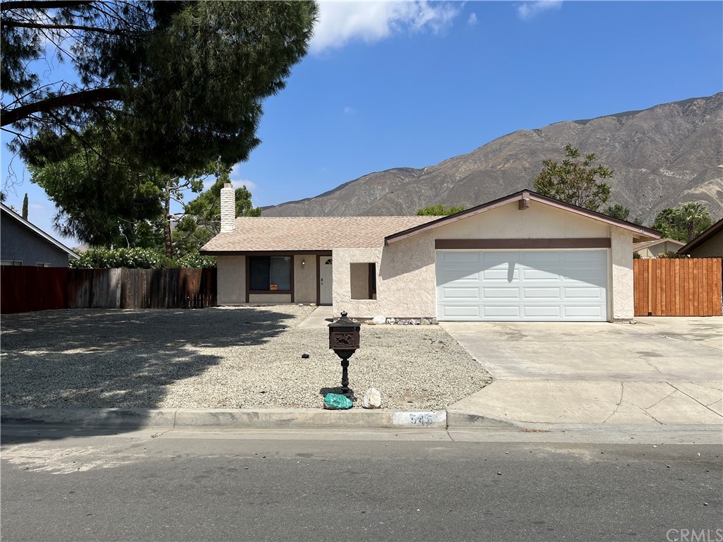 545 Quandt Ranch Road San Jacinto, CA 92583 - Photo 1 of 1 a front view of a house with a yard and garage