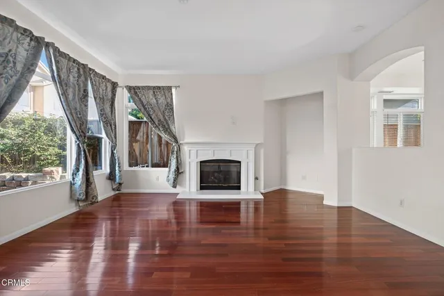 a view of an entryway with wooden floor