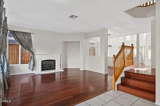 a kitchen with a refrigerator and a sink