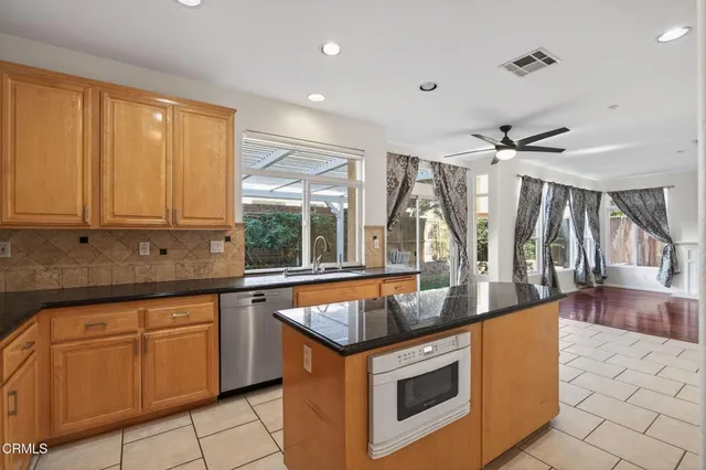 a bathroom with a sink a vanity and a mirror