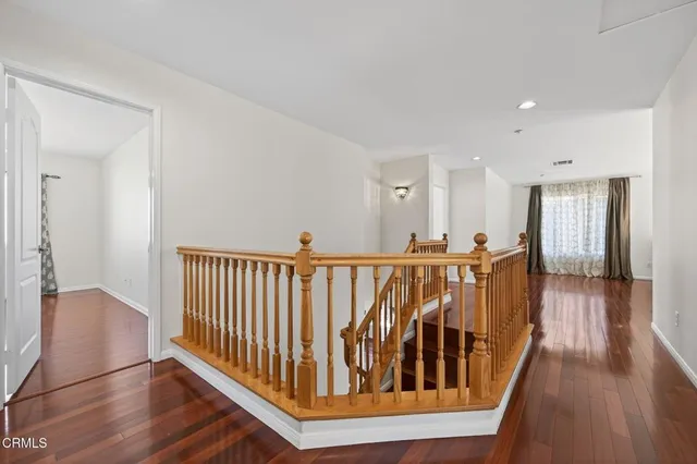 a bathroom with a sink double vanity and a mirror