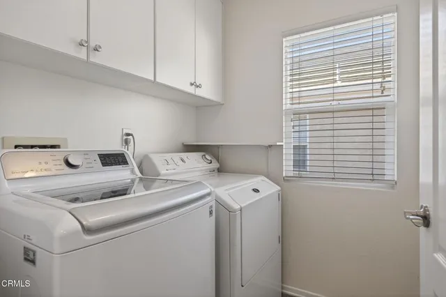 a view of house with backyard and porch