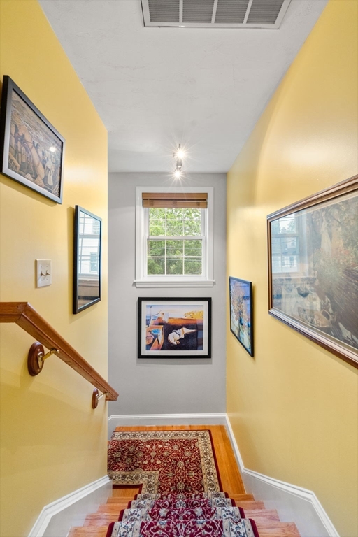 104 Crescent Street, Unit 1 Waltham, MA 02453 - Photo 11 of 30 a picture of a living room with a large window