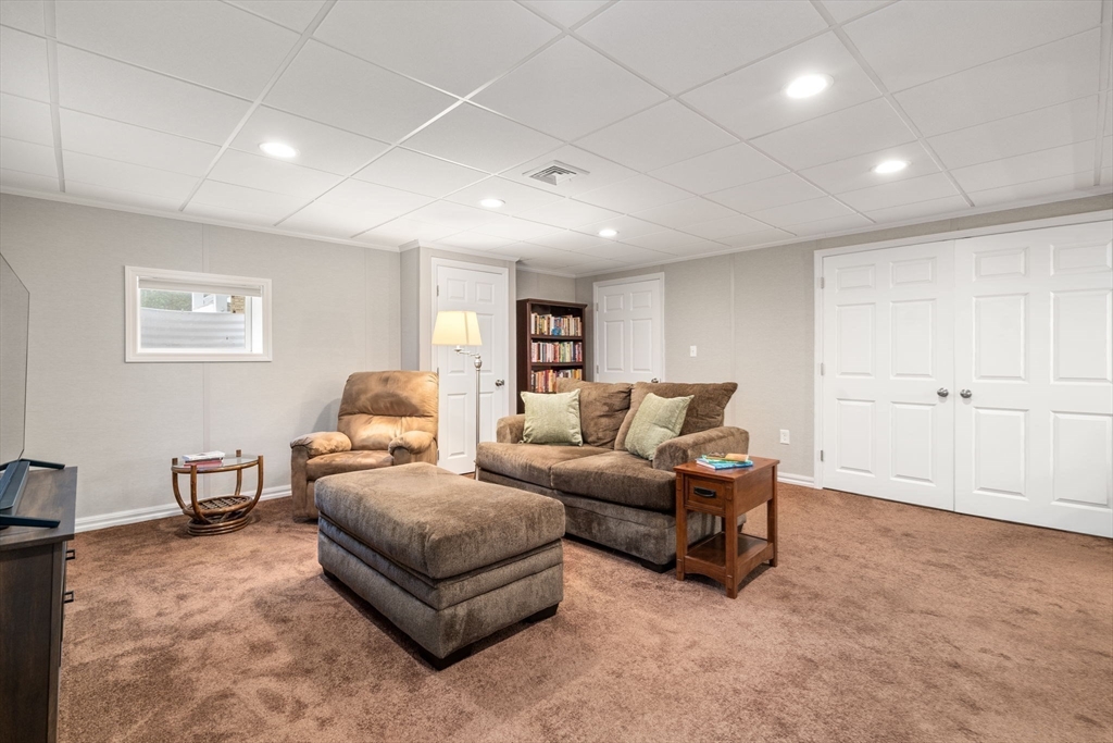 104 Crescent Street, Unit 1 Waltham, MA 02453 - Photo 25 of 30 a living room with furniture