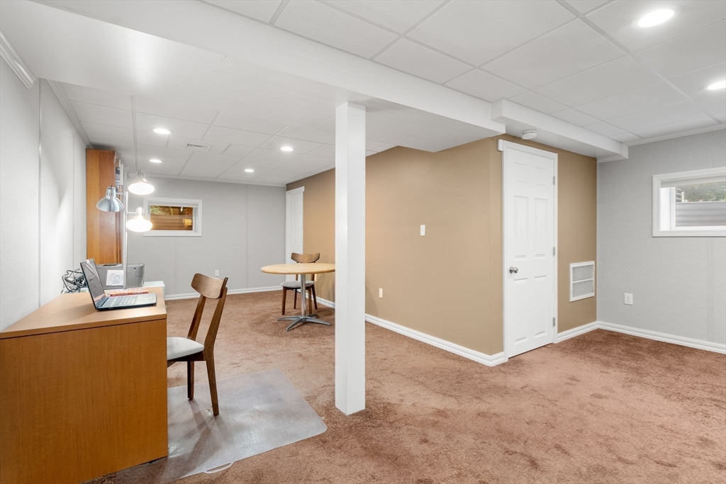 104 Crescent Street, Unit 1 Waltham, MA 02453 - Photo 27 of 30 a view of dining room with furniture and window