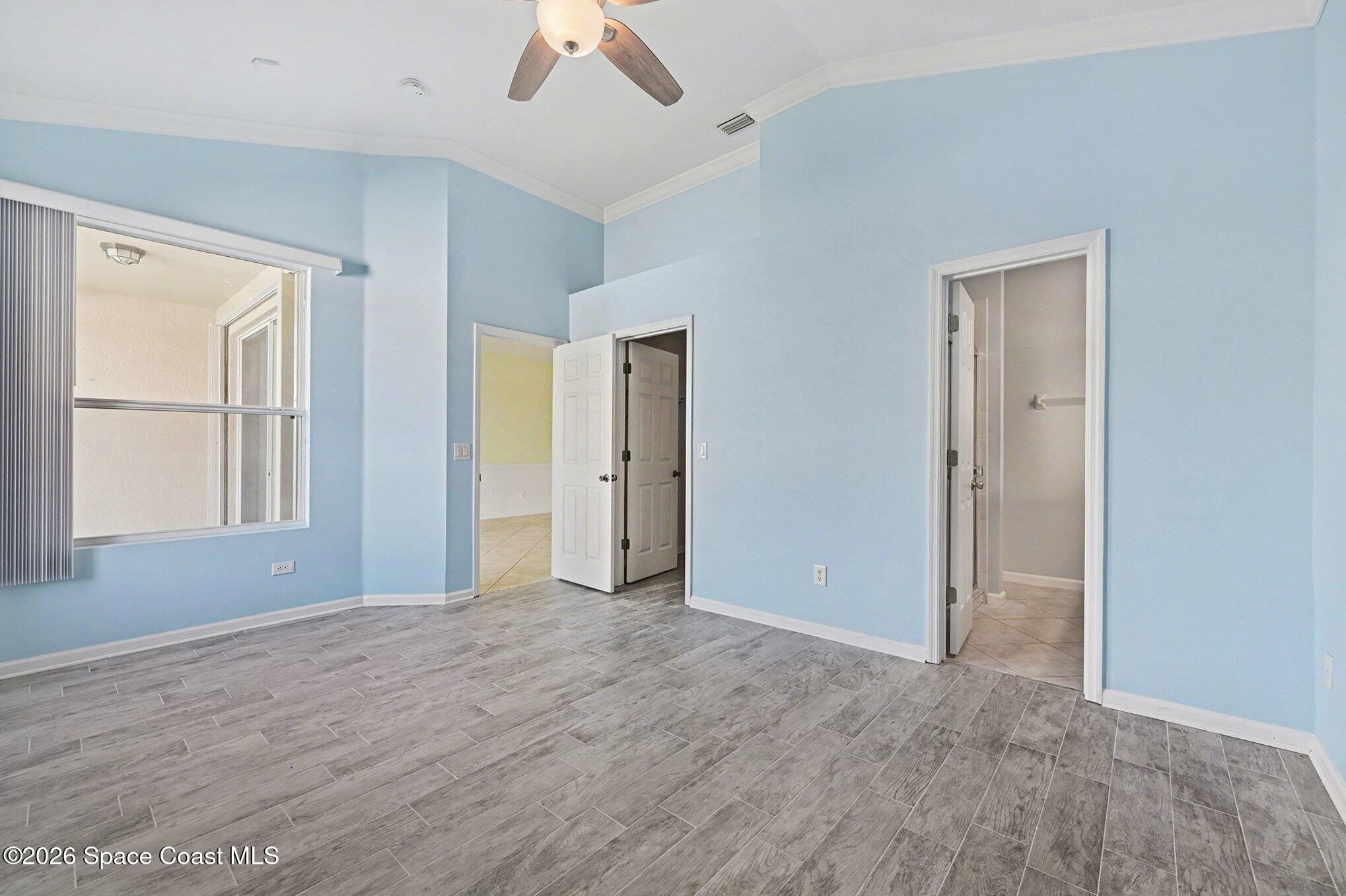 3271 Arden Circle Melbourne, FL 32934 - Photo 12 of 29 a view of an empty room with window and closet area