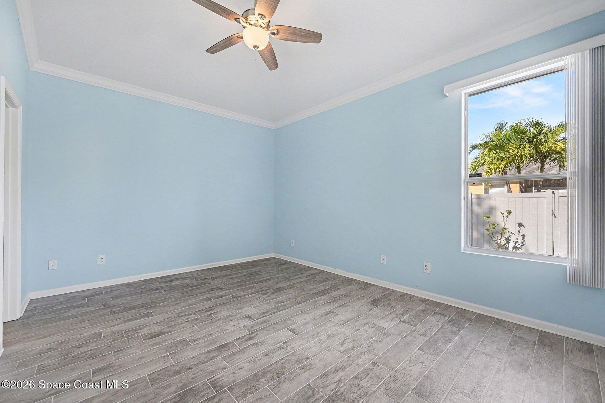 3271 Arden Circle Melbourne, FL 32934 - Photo 13 of 29 a view of an empty room with a window