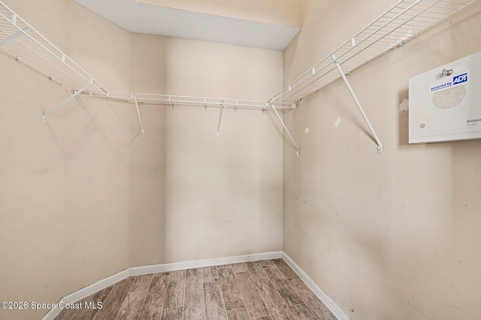 3271 Arden Circle Melbourne, FL 32934 - Photo 15 of 29 a view of a room with racks on the wall