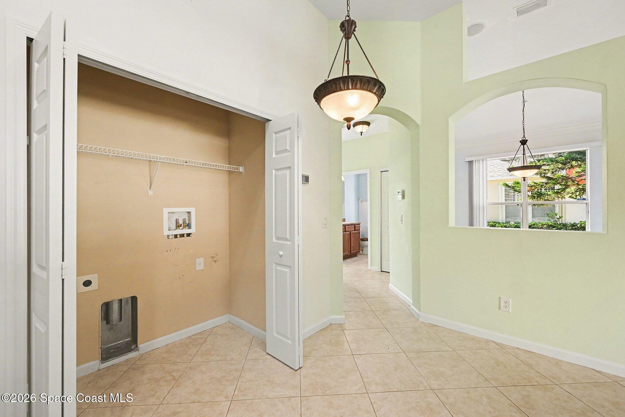 3271 Arden Circle Melbourne, FL 32934 - Photo 21 of 29 a view of a hallway to a room