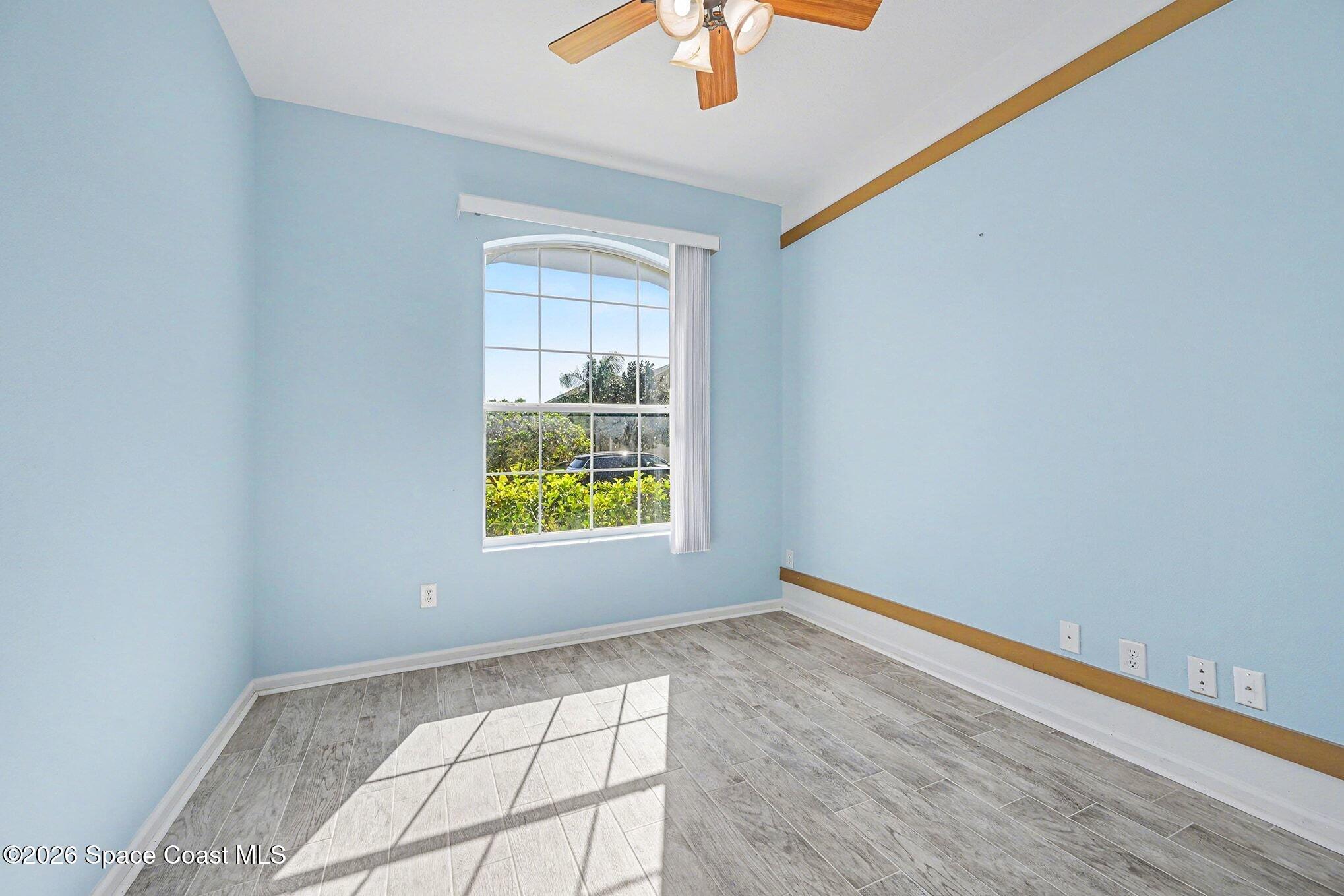 3271 Arden Circle Melbourne, FL 32934 - Photo 22 of 29 a view of an empty room and window