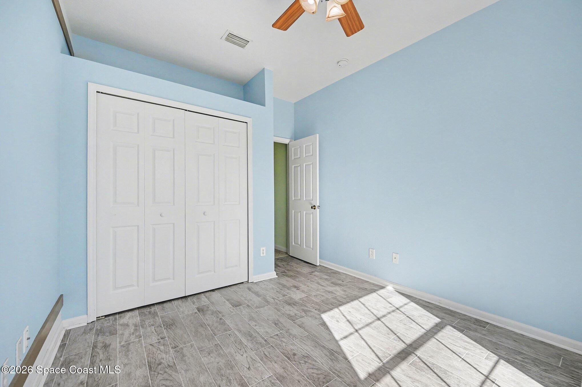 3271 Arden Circle Melbourne, FL 32934 - Photo 23 of 29 an empty room with an entryway