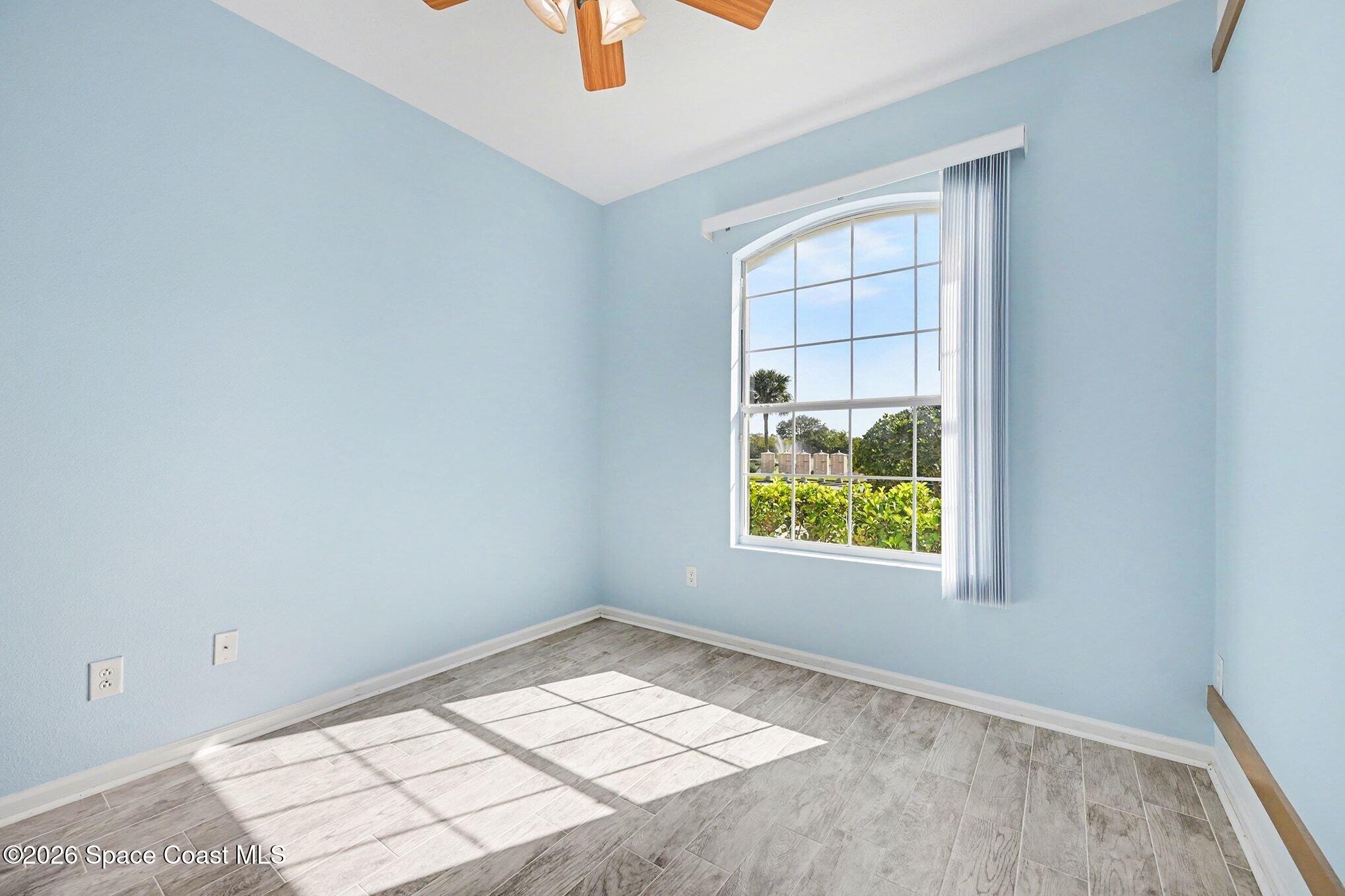 3271 Arden Circle Melbourne, FL 32934 - Photo 24 of 29 an empty room with windows