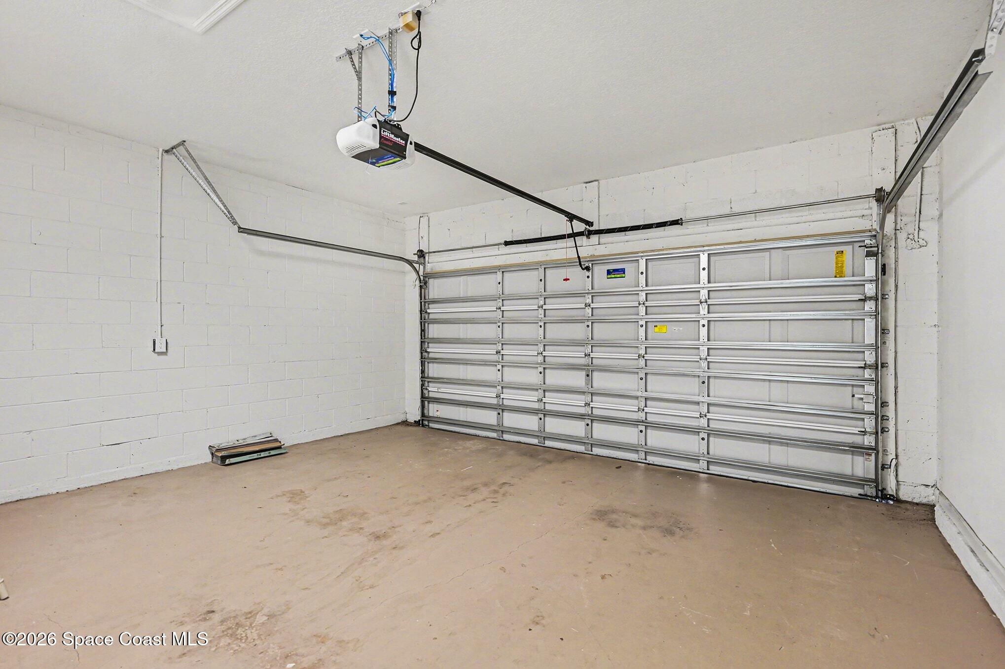 3271 Arden Circle Melbourne, FL 32934 - Photo 29 of 29 a view of a room with rack on the wall