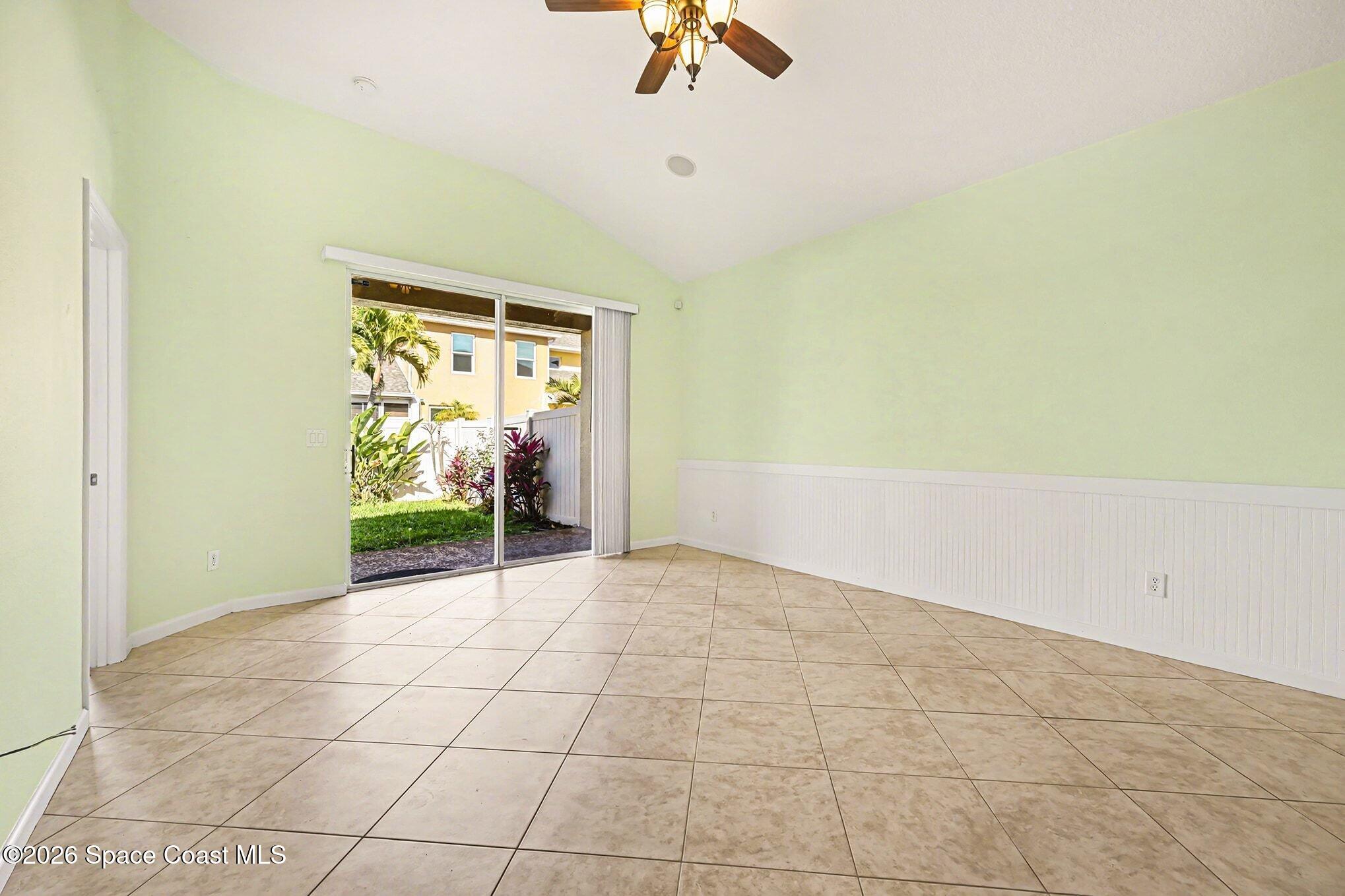 3271 Arden Circle Melbourne, FL 32934 - Photo 9 of 29 a view of an empty room with a window