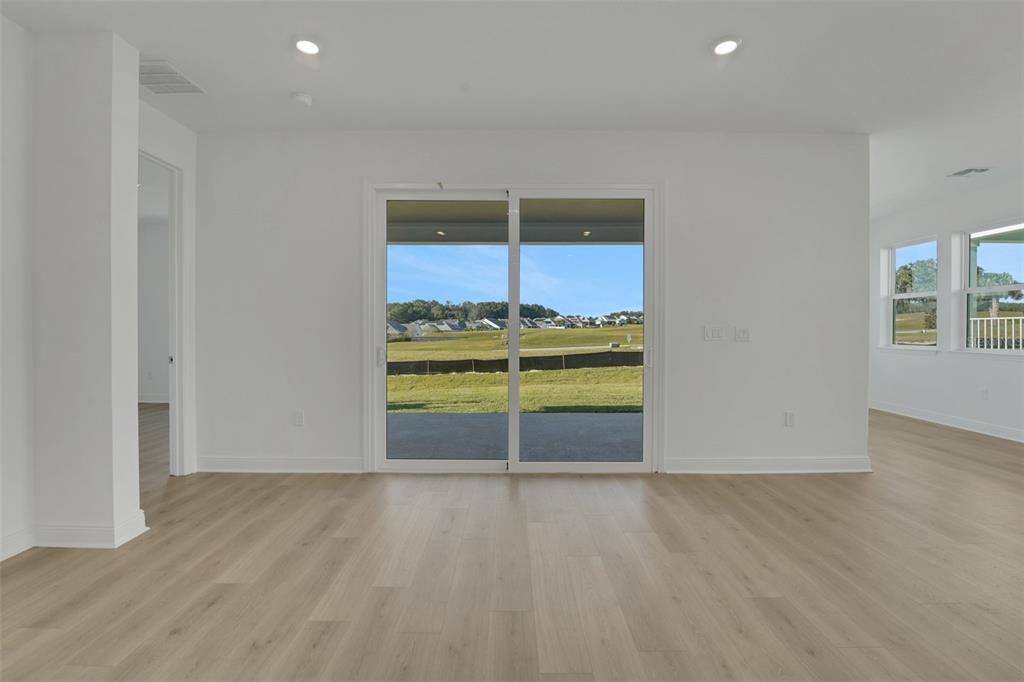 994 Fiesta Key Circle Lady Lake, FL 32159 - Photo 20 of 49 a view of a livingroom with a furniture