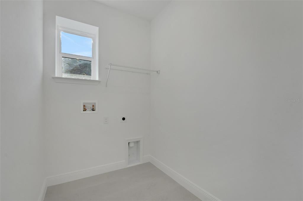 994 Fiesta Key Circle Lady Lake, FL 32159 - Photo 24 of 49 a view of an empty room