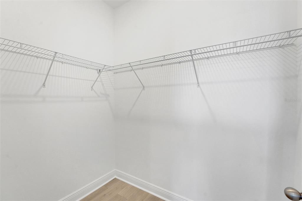 994 Fiesta Key Circle Lady Lake, FL 32159 - Photo 26 of 49 a view of a rack on the wall