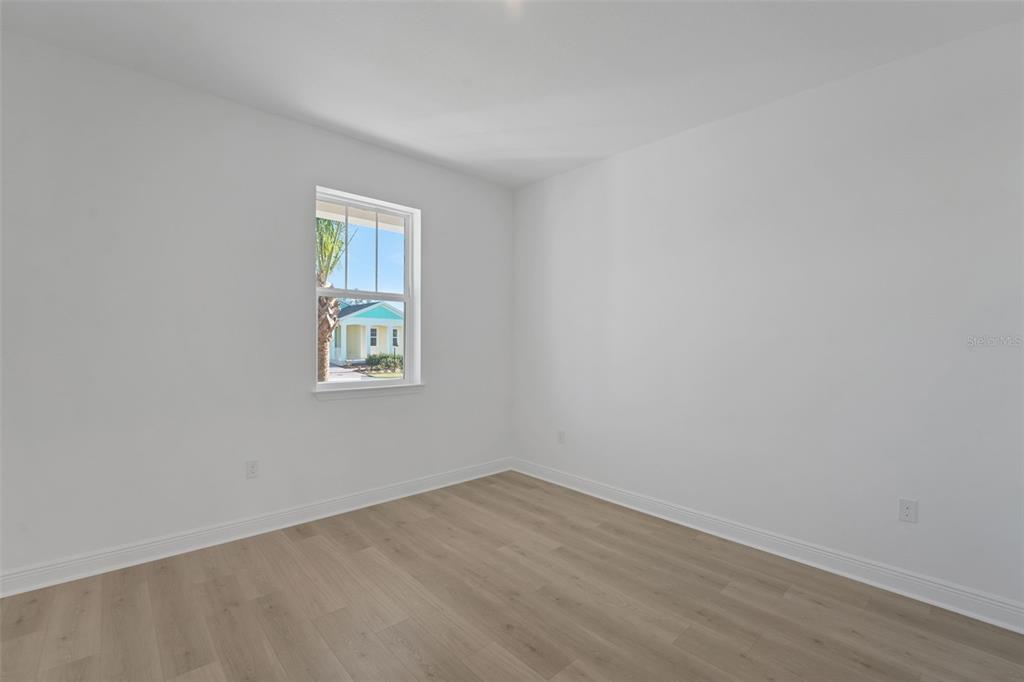 994 Fiesta Key Circle Lady Lake, FL 32159 - Photo 28 of 49 an empty room with a window