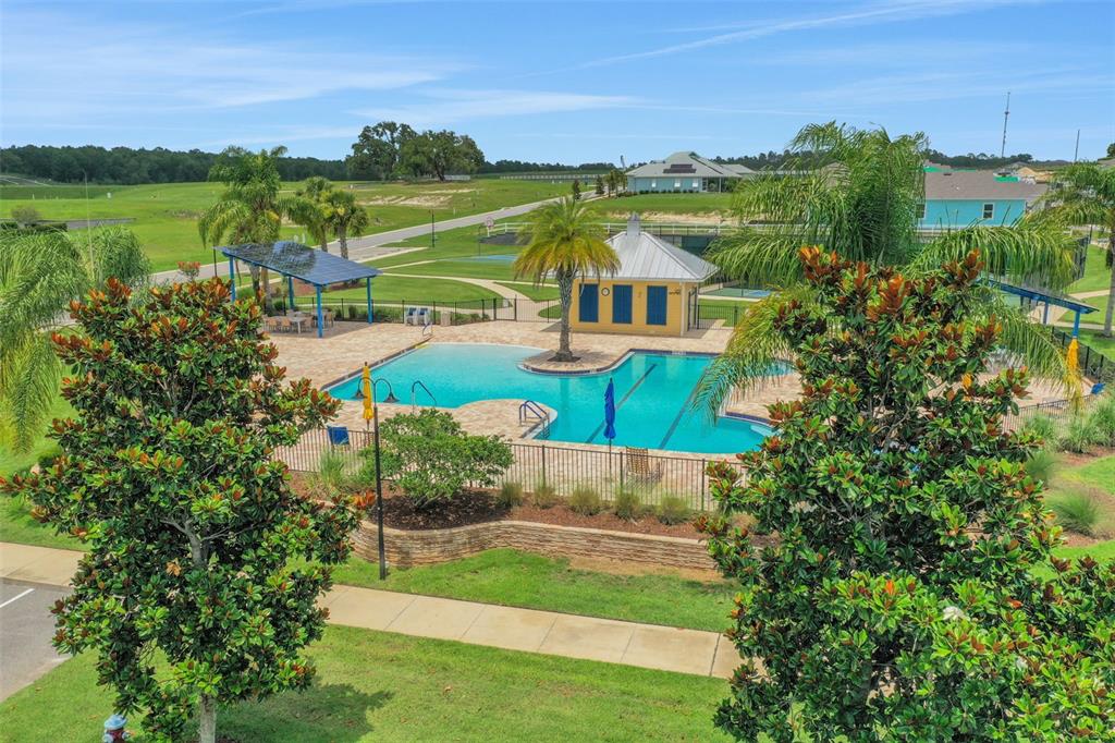 994 Fiesta Key Circle Lady Lake, FL 32159 - Photo 41 of 49 an aerial view of a house with a garden