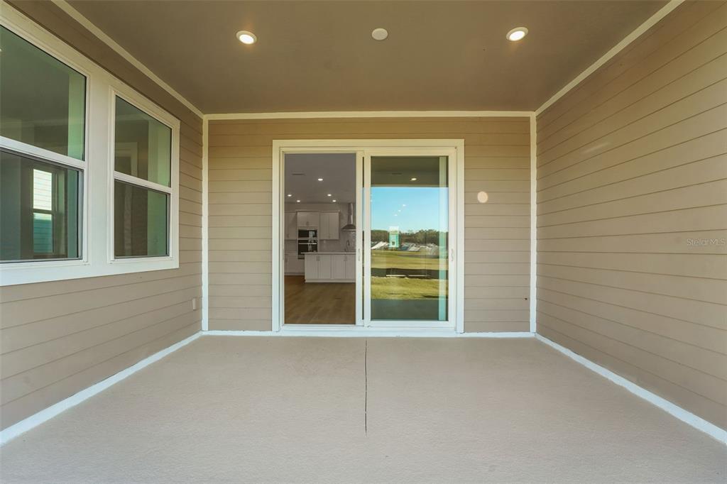 994 Fiesta Key Circle Lady Lake, FL 32159 - Photo 9 of 49 an empty room with windows