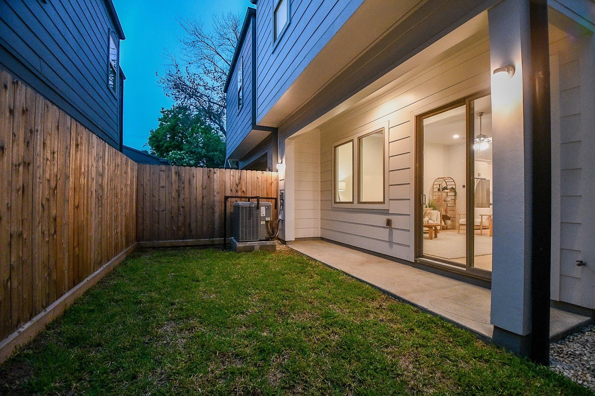 4403 Greeley Street Houston, TX 77006 - Photo 28 of 28 a view of a backyard with wooden fence