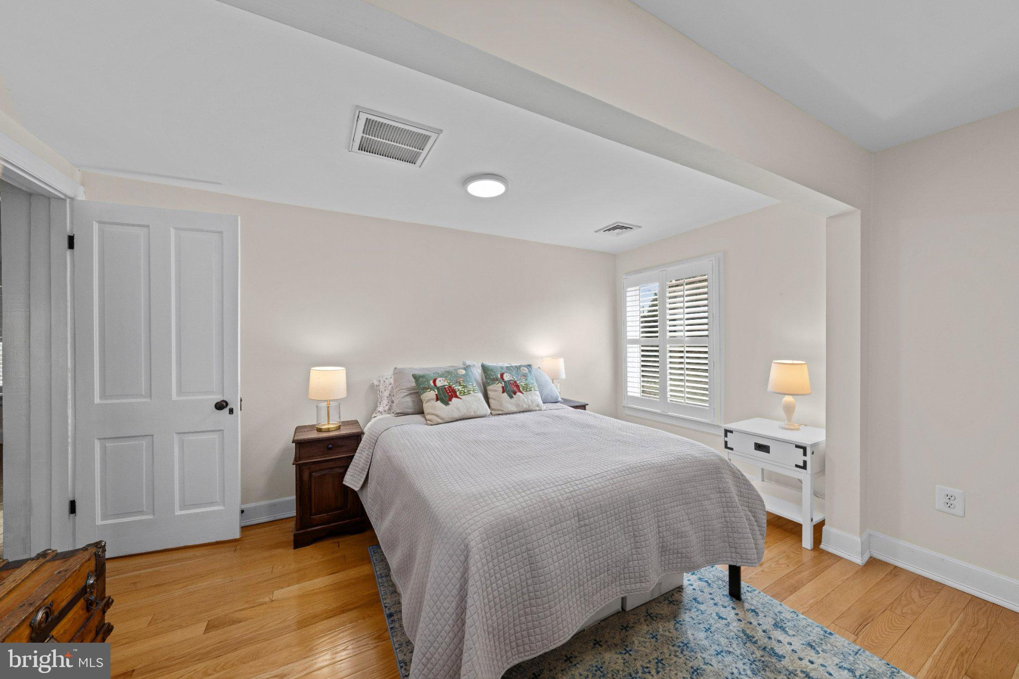 703 Dranesville Road Herndon, VA 20170 - Photo 19 of 35 Serene bedroom with natural light.