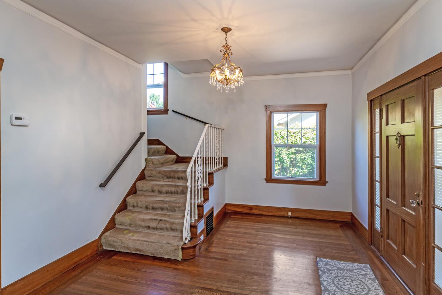425 Hillcrest Road San Mateo, CA 94402 - Photo 12 of 48 wooden floor in an empty room with a window