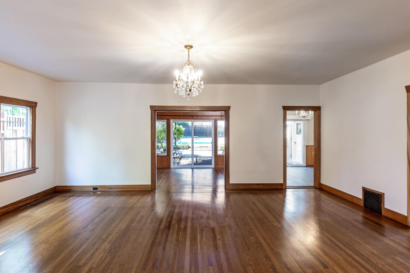 425 Hillcrest Road San Mateo, CA 94402 - Photo 15 of 48 a view of livingroom with hardwood floor and window