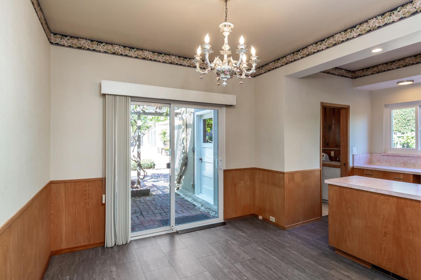 425 Hillcrest Road San Mateo, CA 94402 - Photo 21 of 48 a view of a room with wooden floor and large windows