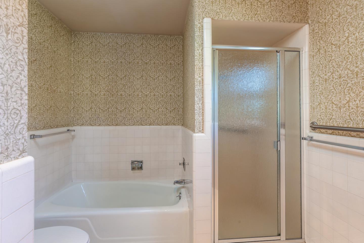 425 Hillcrest Road San Mateo, CA 94402 - Photo 25 of 48 a bathroom with a bathtub
