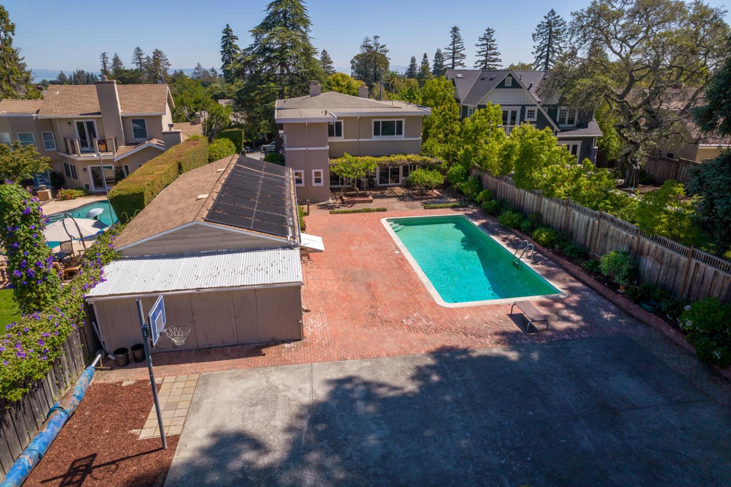 425 Hillcrest Road San Mateo, CA 94402 - Photo 3 of 48 an aerial view of a house with a garden and patio