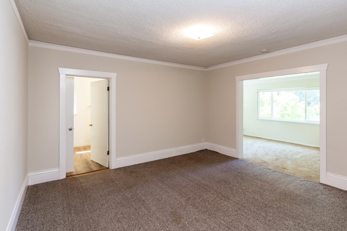 425 Hillcrest Road San Mateo, CA 94402 - Photo 31 of 48 an empty room with windows