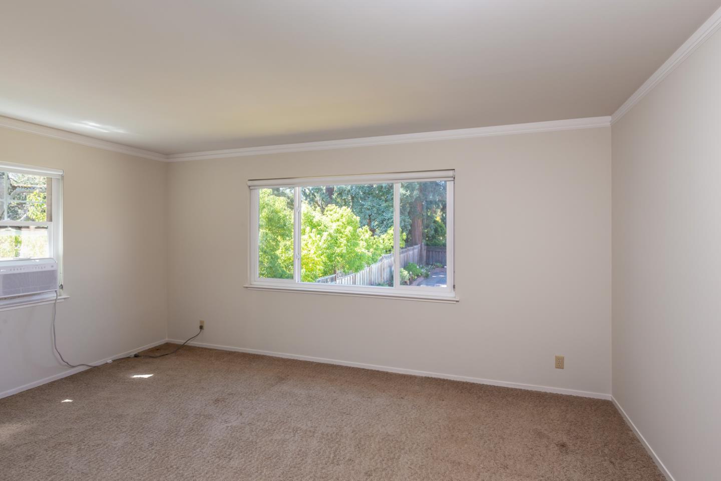 425 Hillcrest Road San Mateo, CA 94402 - Photo 32 of 48 an empty room with a window