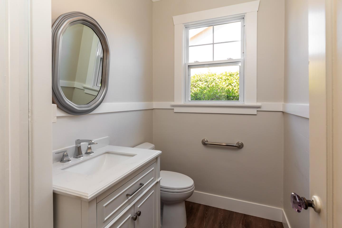 425 Hillcrest Road San Mateo, CA 94402 - Photo 46 of 48 a bathroom with a sink a toilet and a window