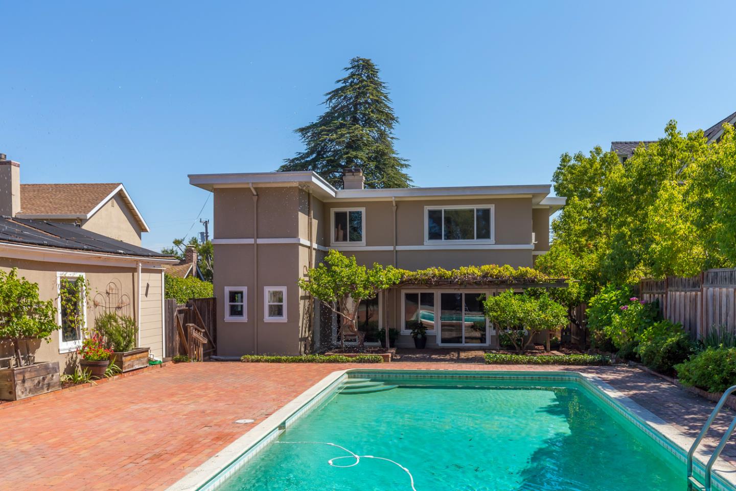 425 Hillcrest Road San Mateo, CA 94402 - Photo 7 of 48 a front view of house with yard outdoor seating and green space