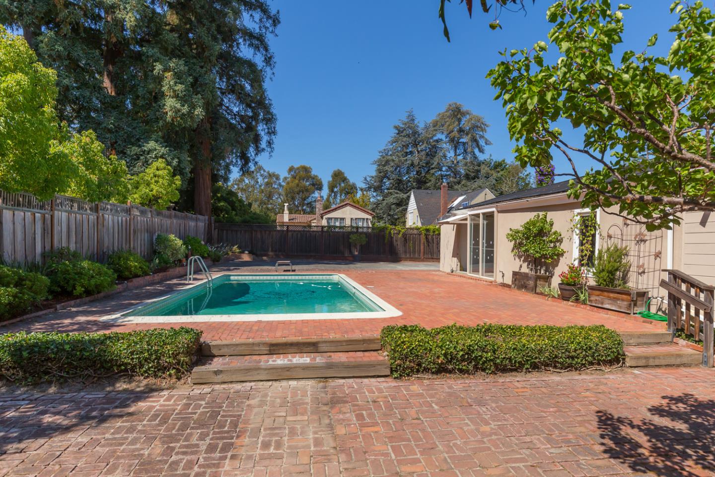 425 Hillcrest Road San Mateo, CA 94402 - Photo 10 of 48 a view of backyard with swimming pool and patio