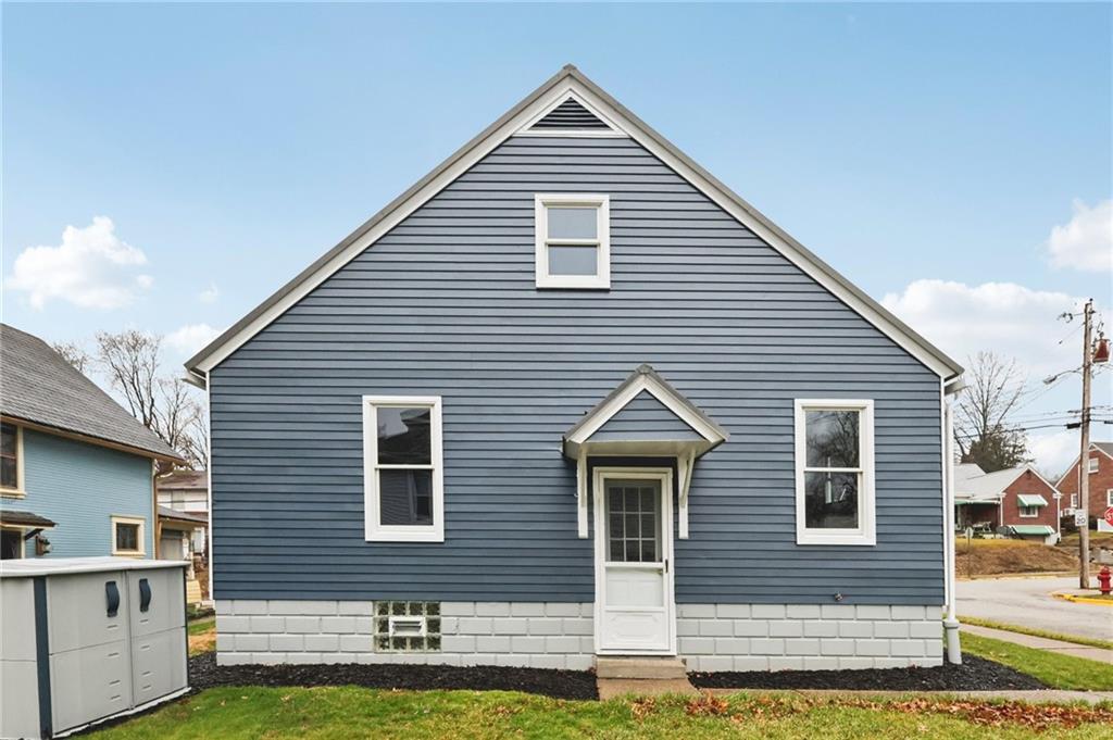 380 James Street Springdale, PA 15144 - Photo 29 of 34 a front view of a house with a yard
