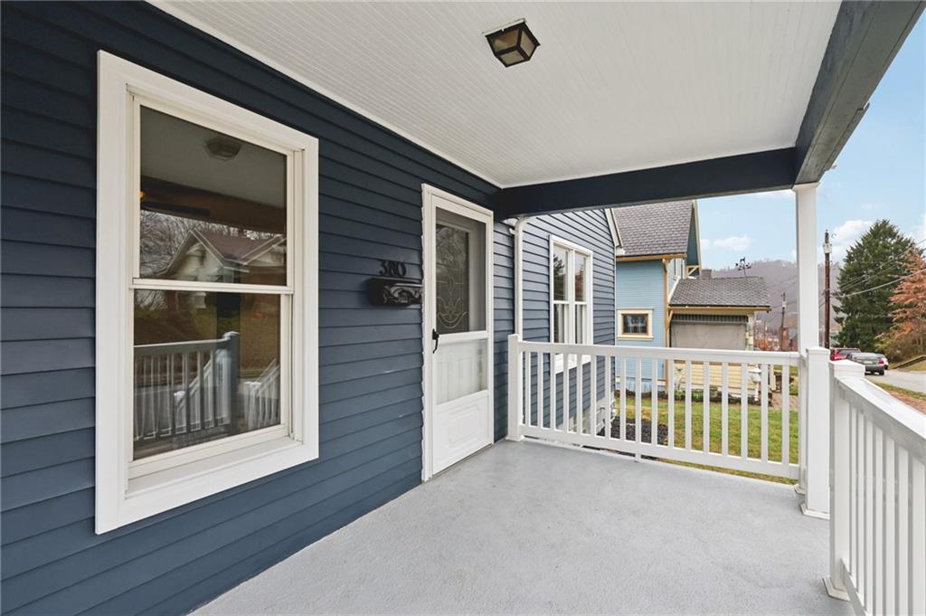 380 James Street Springdale, PA 15144 - Photo 6 of 34 a view of a house with a porch