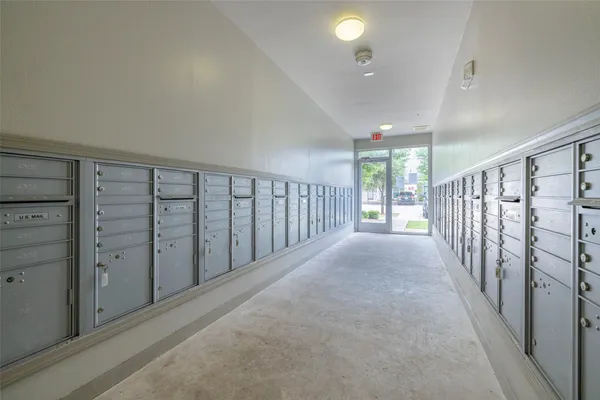 a view of a hallway with closet area
