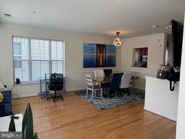 a view of entryway with wooden floor