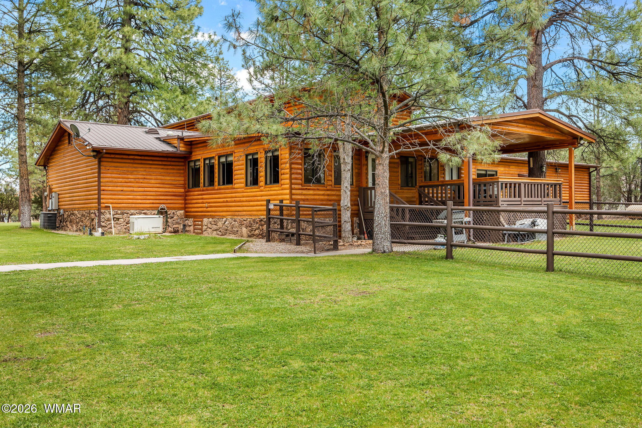 2922 Pine Rim Road Overgaard, AZ 85933 - Photo 43 of 58 a view of a house with a yard