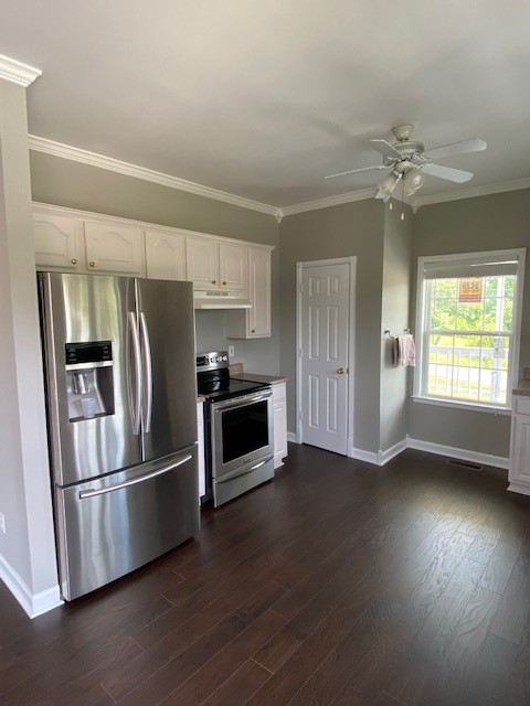 830 Blakemore Road Dickson, TN 37055 - Photo 11 of 33 a kitchen with stainless steel appliances a refrigerator and a stove top oven