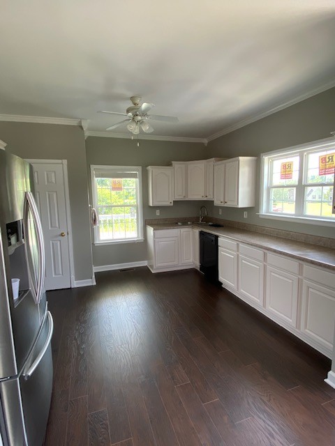 830 Blakemore Road Dickson, TN 37055 - Photo 12 of 33 a kitchen with granite countertop stainless steel appliances sink and cabinets
