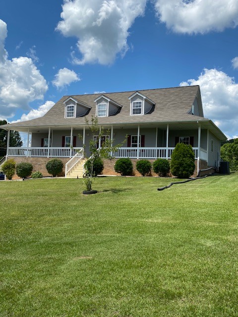 830 Blakemore Road Dickson, TN 37055 - Photo 2 of 33 a view of a house with a backyard