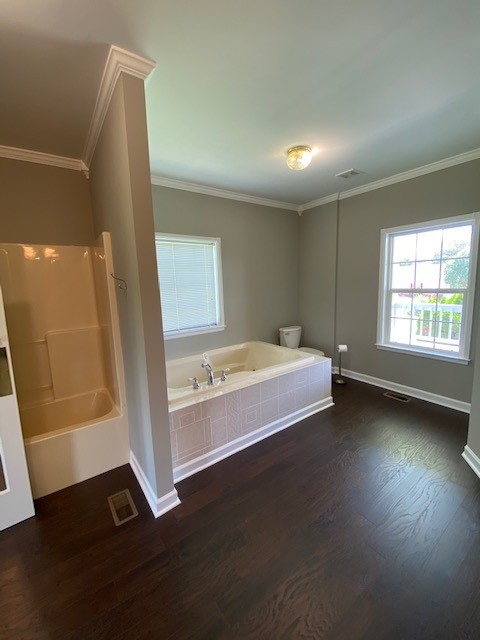 830 Blakemore Road Dickson, TN 37055 - Photo 22 of 33 a spacious bedroom with a bed and a window