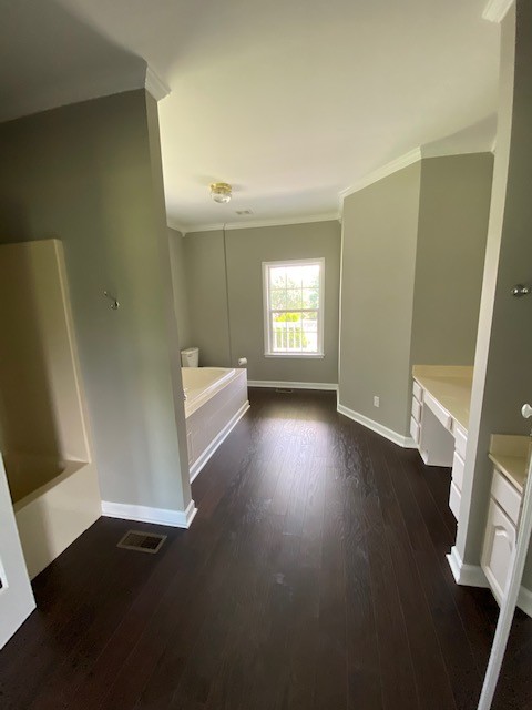 830 Blakemore Road Dickson, TN 37055 - Photo 23 of 33 an empty room with wooden floor and windows