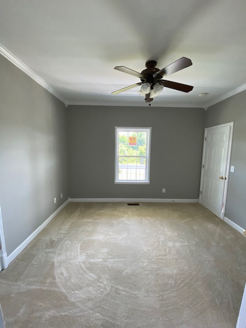 830 Blakemore Road Dickson, TN 37055 - Photo 25 of 33 a view of a ceiling fan and a window