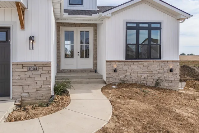a view of a entryway door front of house